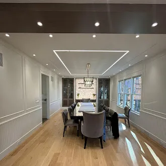 Dining room after — finished, fully appointed dining space